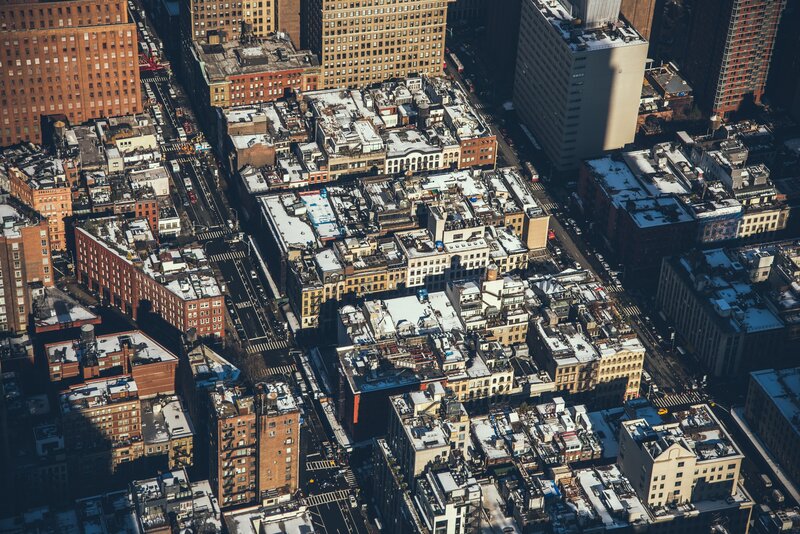 Aerial View of City Rooftops — Brown