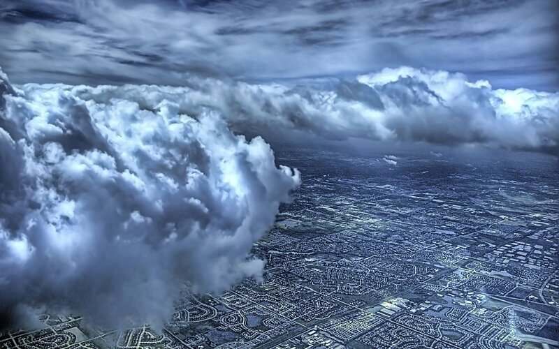 Aerial view of city under storm clouds