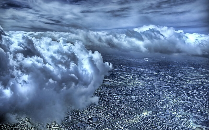 Aerial view of city under storm clouds