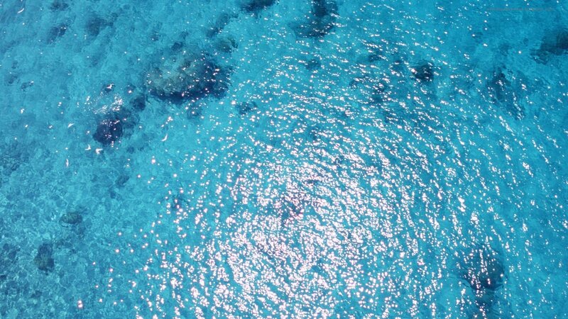 Aerial view of clear blue water