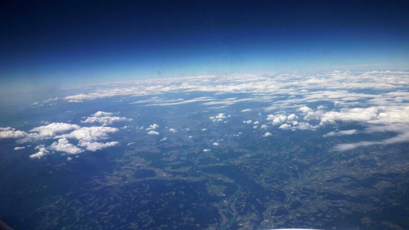 Aerial View of Clouds and Land