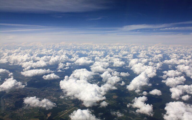 Aerial view of clouds and landscape
