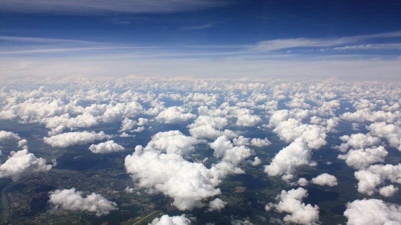 Aerial view of clouds and landscape