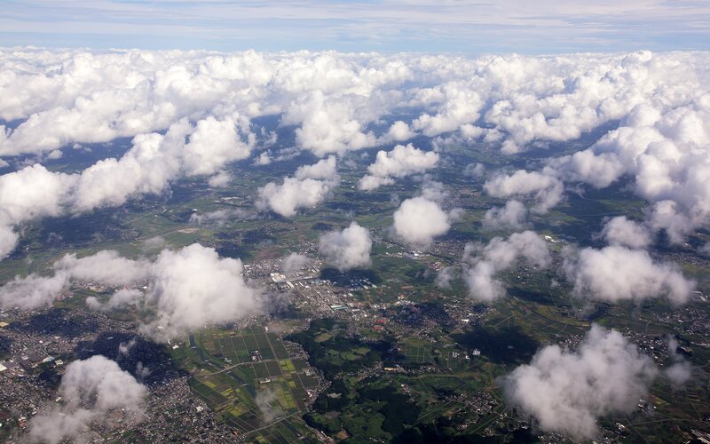 Aerial view of clouds and landscape