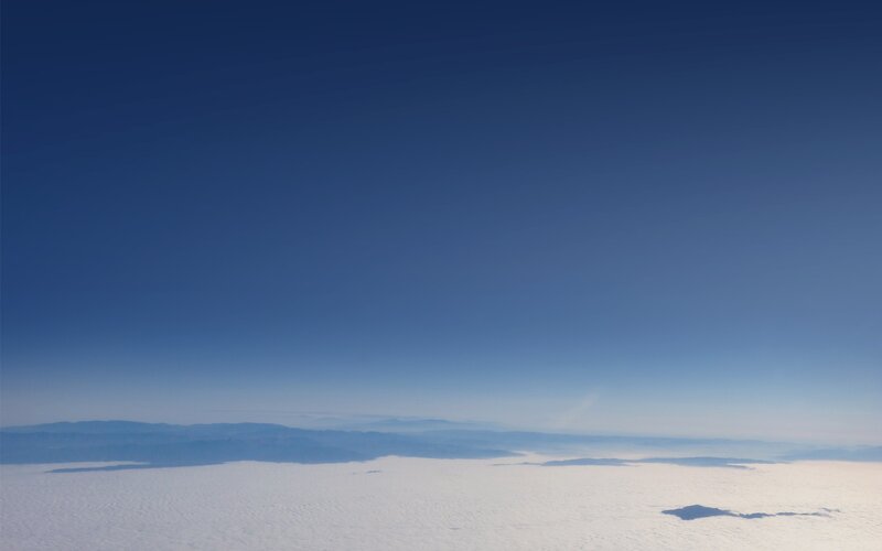 Aerial view of clouds and mountains