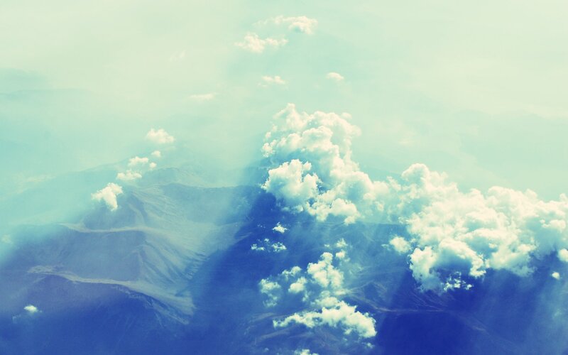 Aerial view of clouds and mountains