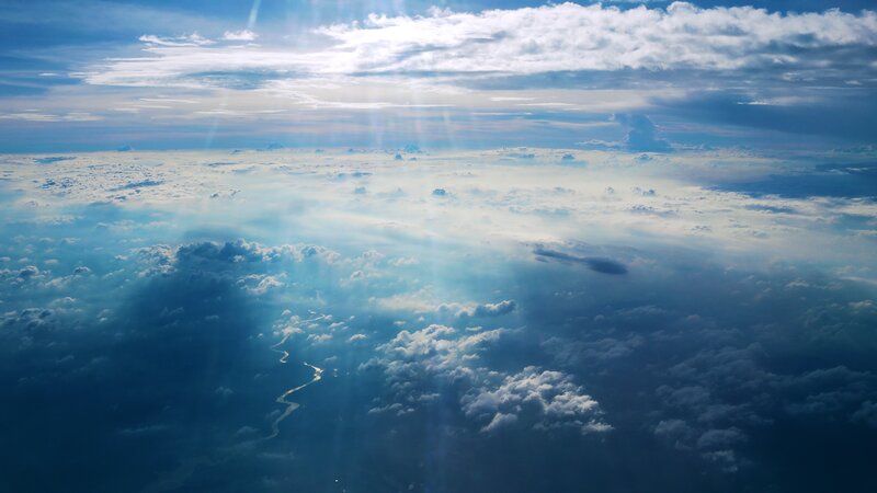 Aerial View of Clouds and River