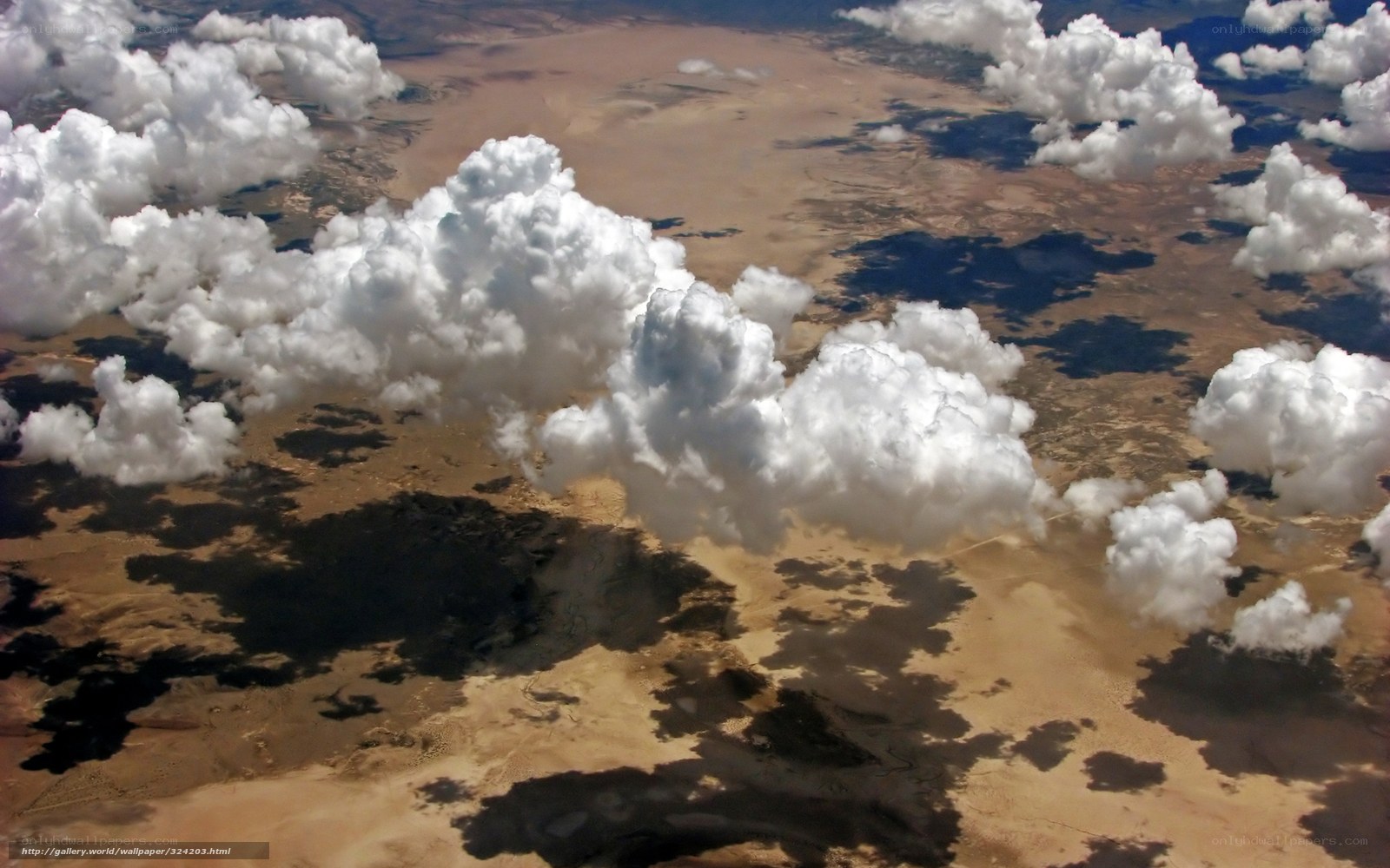 Aerial view of clouds over desert