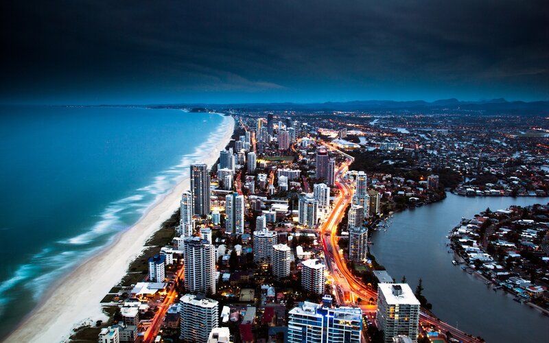 Aerial view of coastal city at dusk