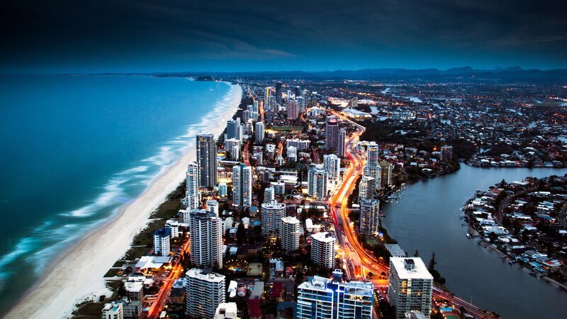 Aerial view of coastal city at night