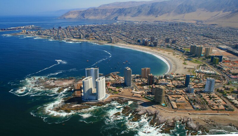 Aerial View of Coastal City — Blue, Serene, Afternoon, Photograph, Beach, Mountains