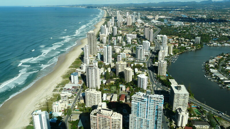 Aerial View of Coastal City — Blue, Serene, Afternoon, Photograph, Beach