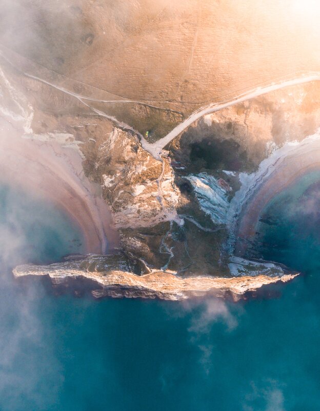 Aerial View of Coastal Cliffs — Blue, Serene
