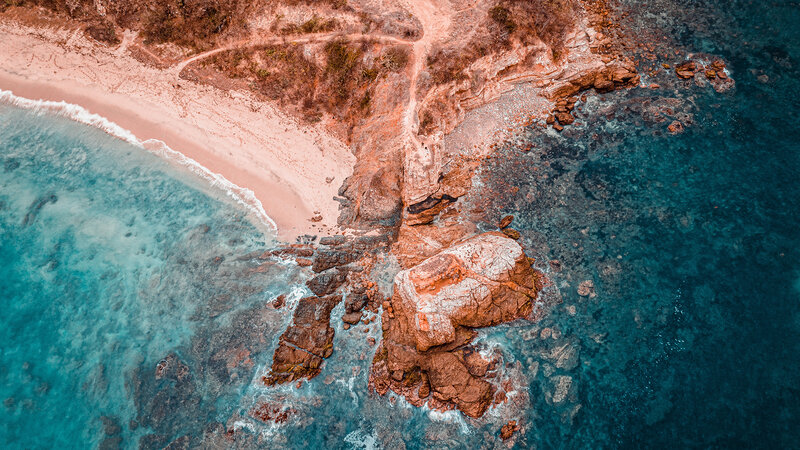 Aerial View of Coastal Rocks — Blue