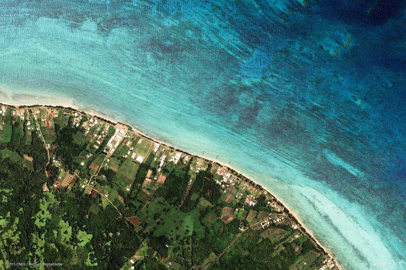 Aerial View of Coastal Village — Blue