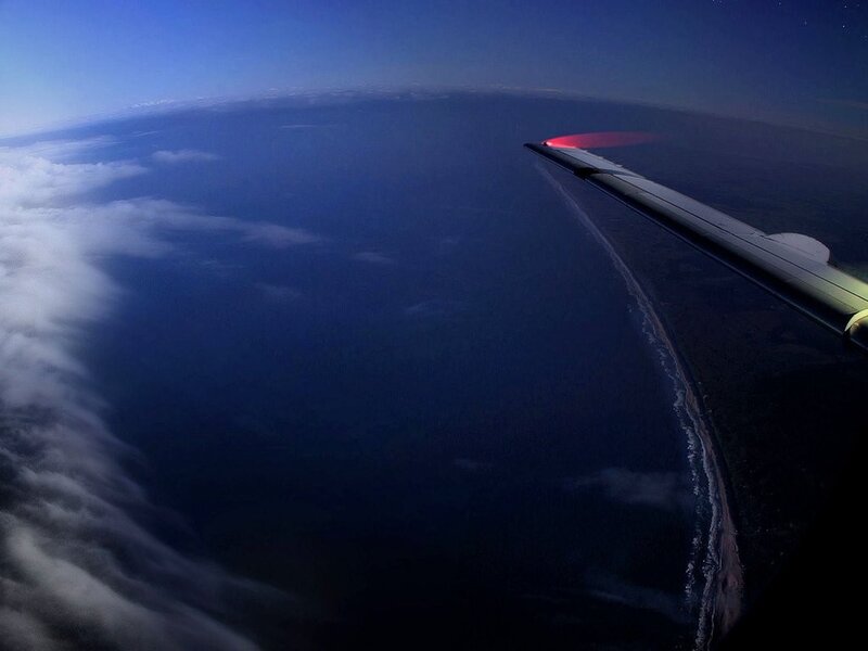 Aerial view of coastline at dusk