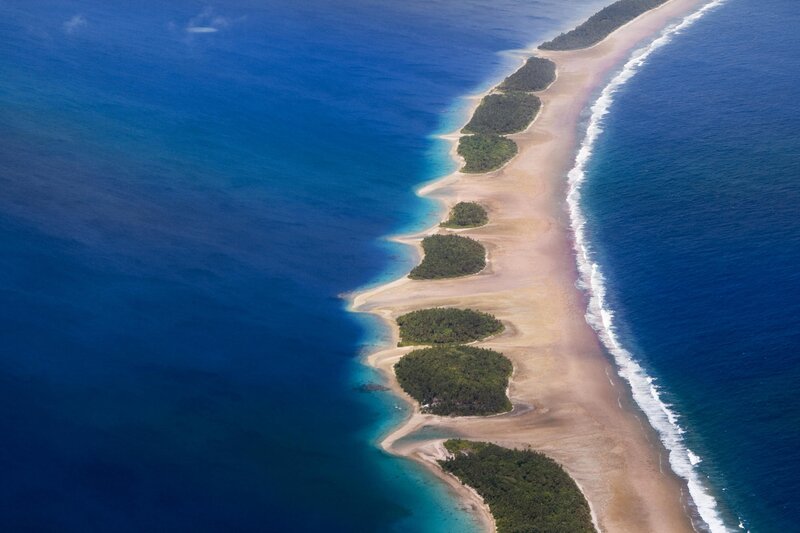 Aerial View of Coral Atoll — Blue, Serene, Afternoon, Photograph, Ocean, Sandbar, Islands, Waves, Green, Brown