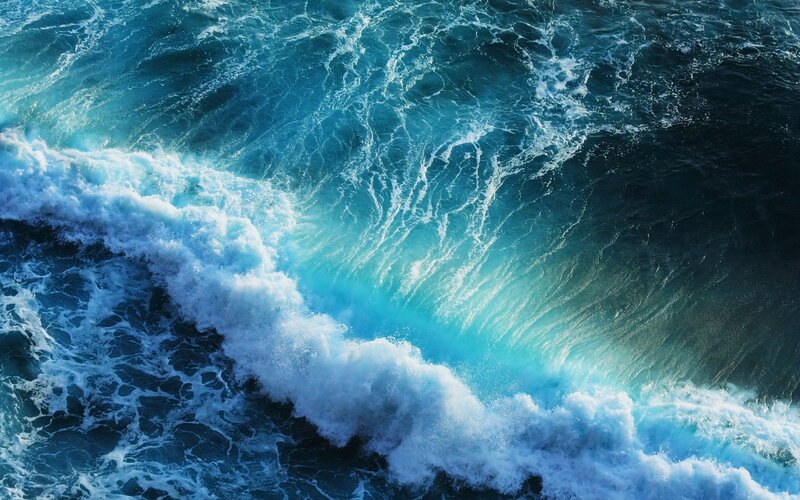 Aerial view of crashing ocean waves