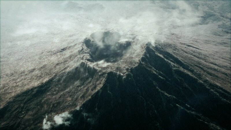 Aerial view of erupting volcano