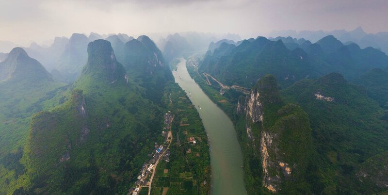 Aerial view of karst mountains and river