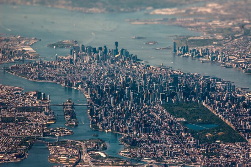 Aerial View of Manhattan — Blue, Dramatic, Afternoon, Photograph, Skyscrapers, Rivers, Bridges