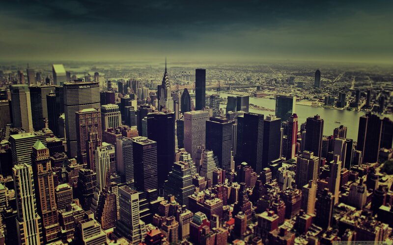Aerial View of New York City — Gray, Dramatic, Afternoon, Photograph, Skyscrapers, River, Bridge, Brown, Green