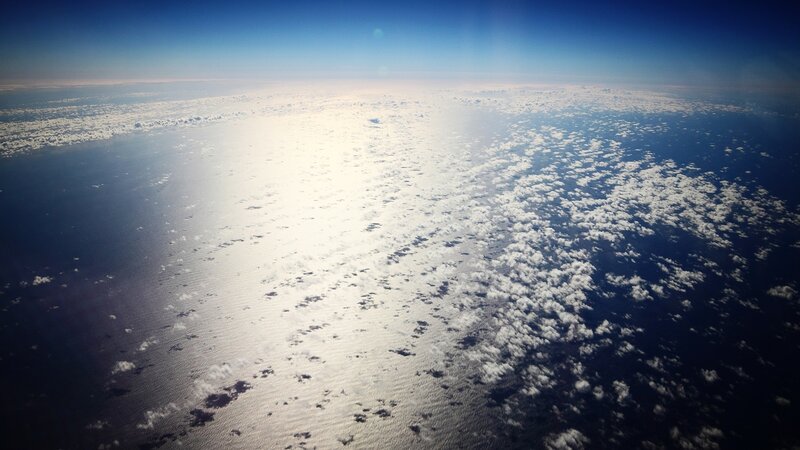 Aerial view of ocean and clouds