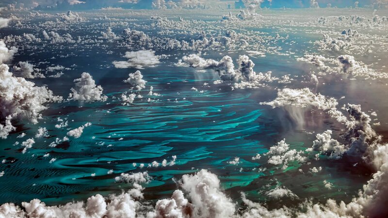 Aerial View of Ocean and Clouds — Blue, Serene, Afternoon