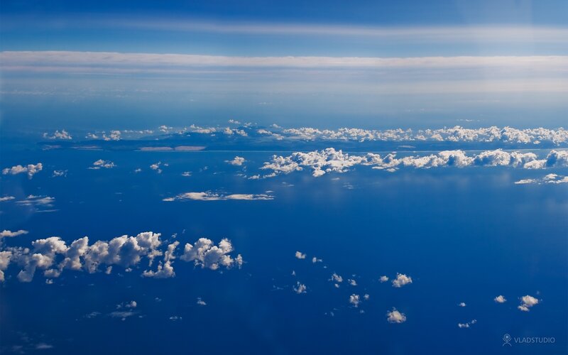 Aerial View of Ocean and Clouds — Blue