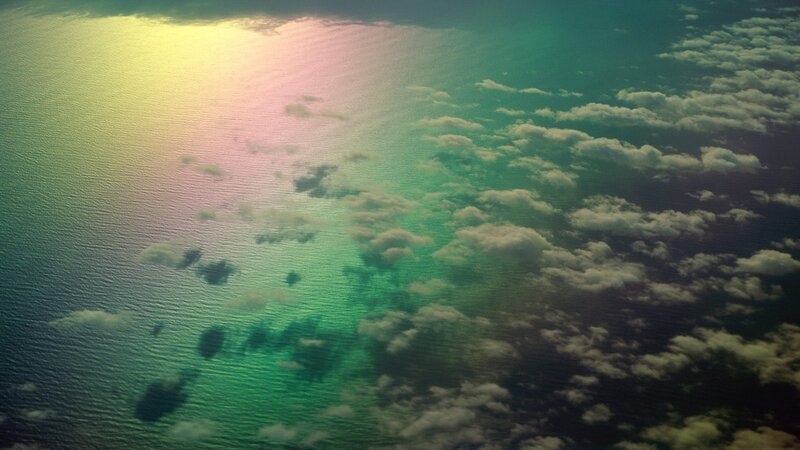 Aerial View of Ocean and Clouds — Green