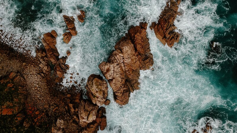 Aerial View of Ocean Waves — Blue, Dramatic, Photograph, Rocks, Foam