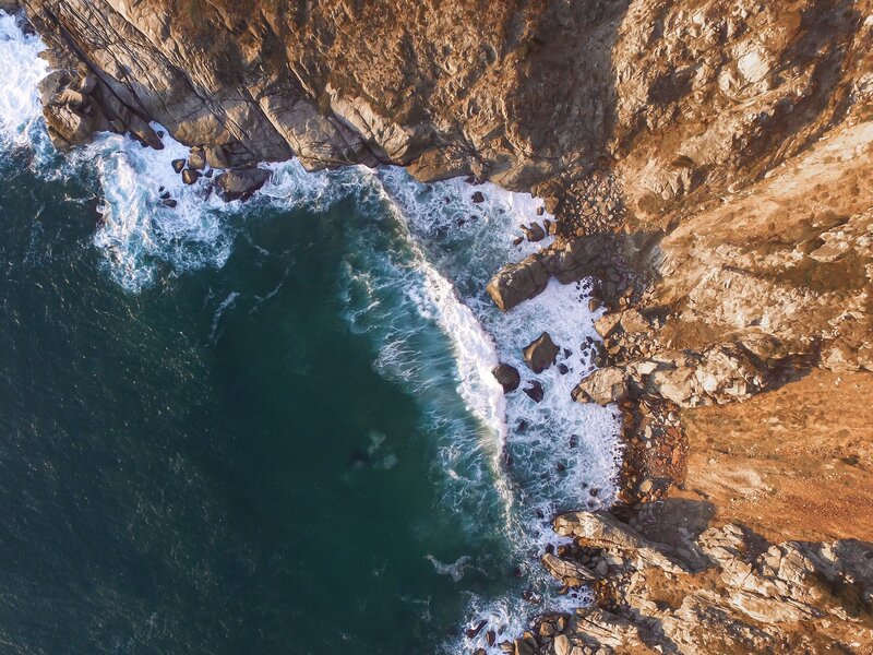 Aerial View of Ocean Waves — Blue, Dramatic, Sunset