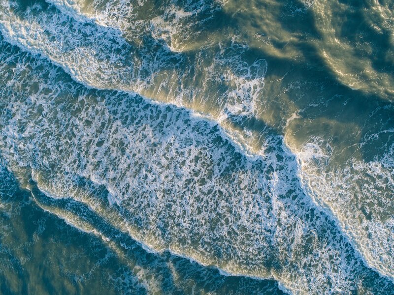 Aerial View of Ocean Waves — Blue, Dynamic, Afternoon, Photograph