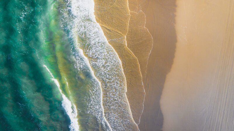 Aerial View of Ocean Waves — Green, Serene, Afternoon