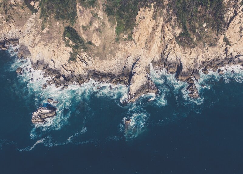 Aerial View of Rocky Coastline — Blue, Dramatic