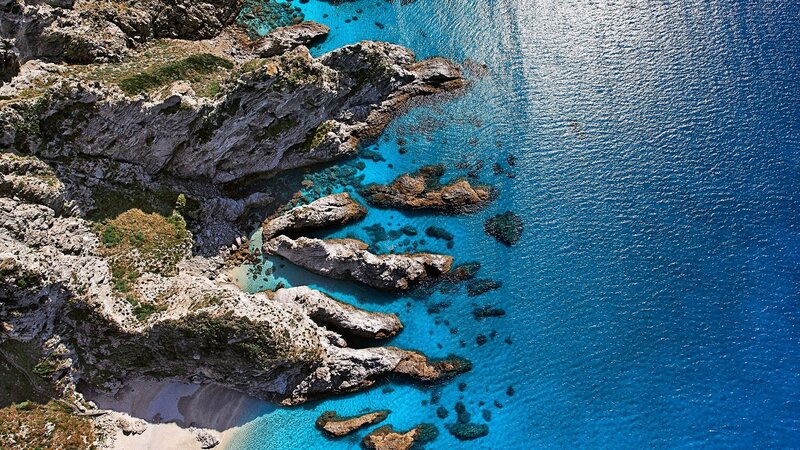 Aerial View of Rocky Coastline — Blue, Serene, Afternoon