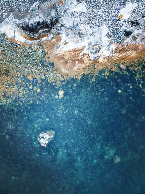 Aerial View of Rocky Shore — Blue, Serene, Photograph