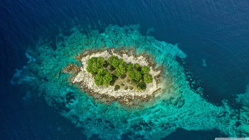Aerial View of Small Island — Blue