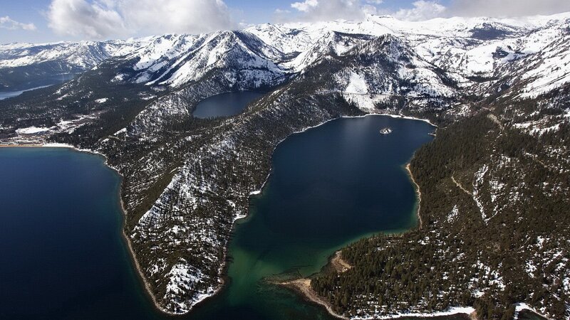 Aerial view of snow-covered mountains and lakes