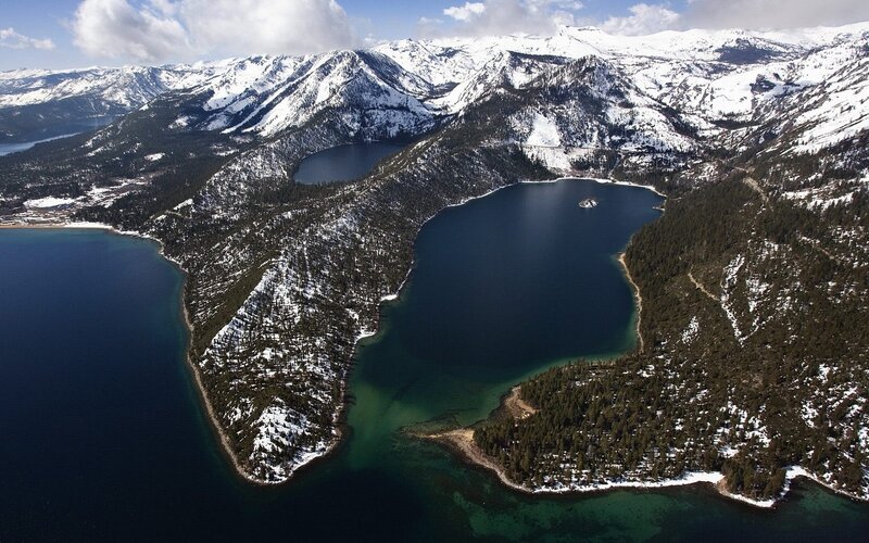 Aerial view of snow-covered mountains and lakes