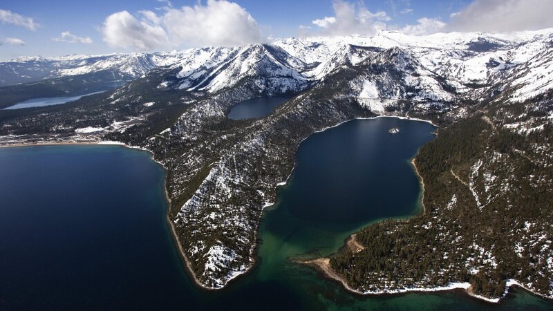 Aerial view of snowy mountains and lakes