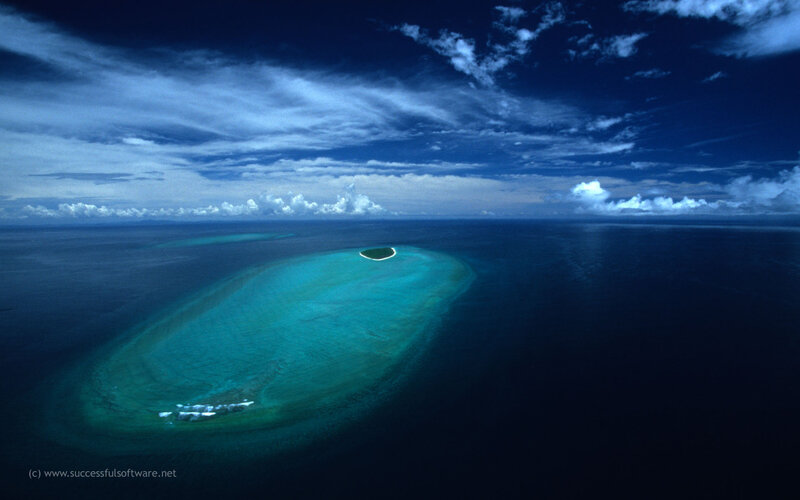 Aerial View of Tropical Island — Blue, Serene, Afternoon, Photograph, Ocean, Clouds