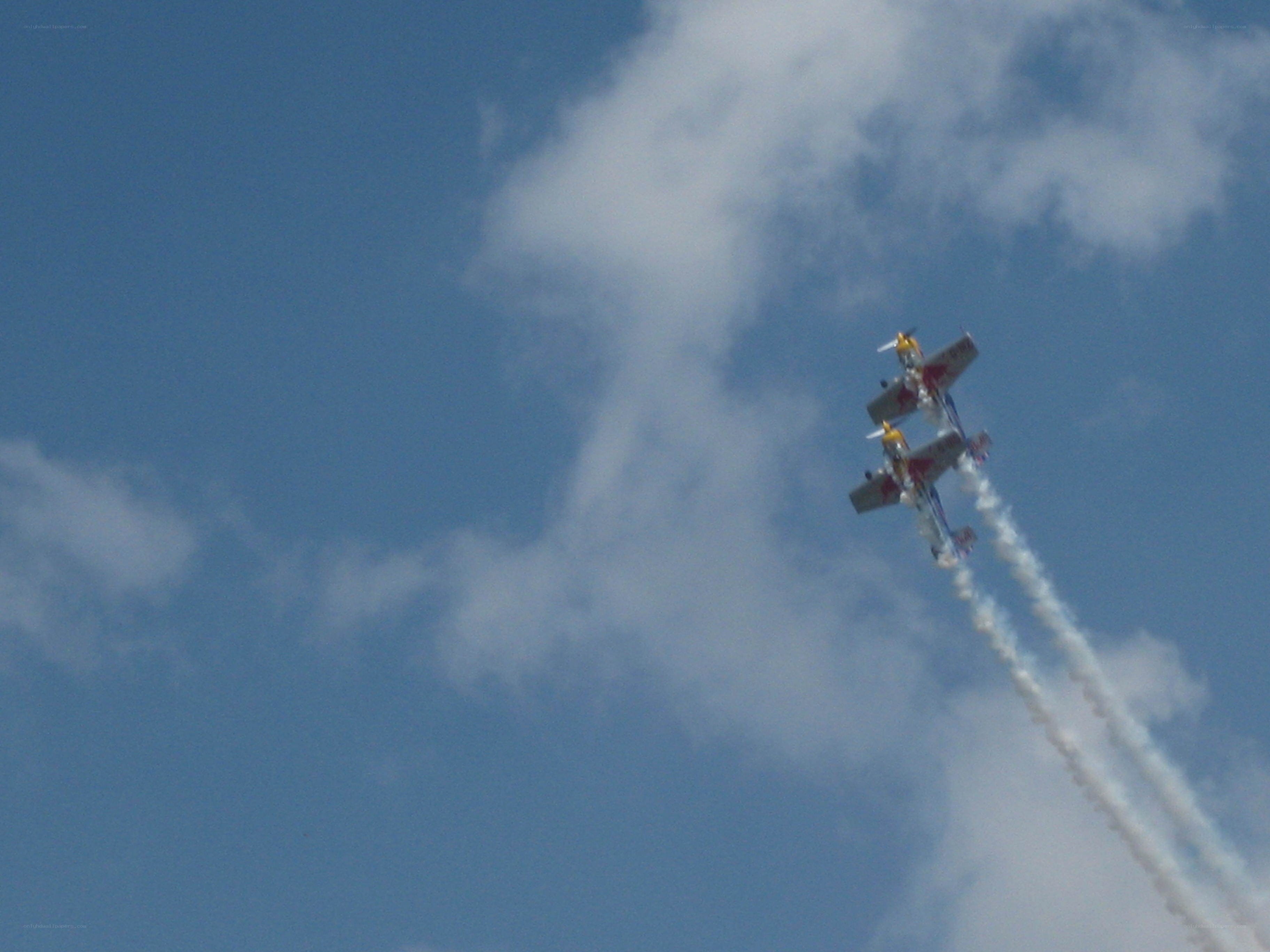 Aerobatic planes in flight