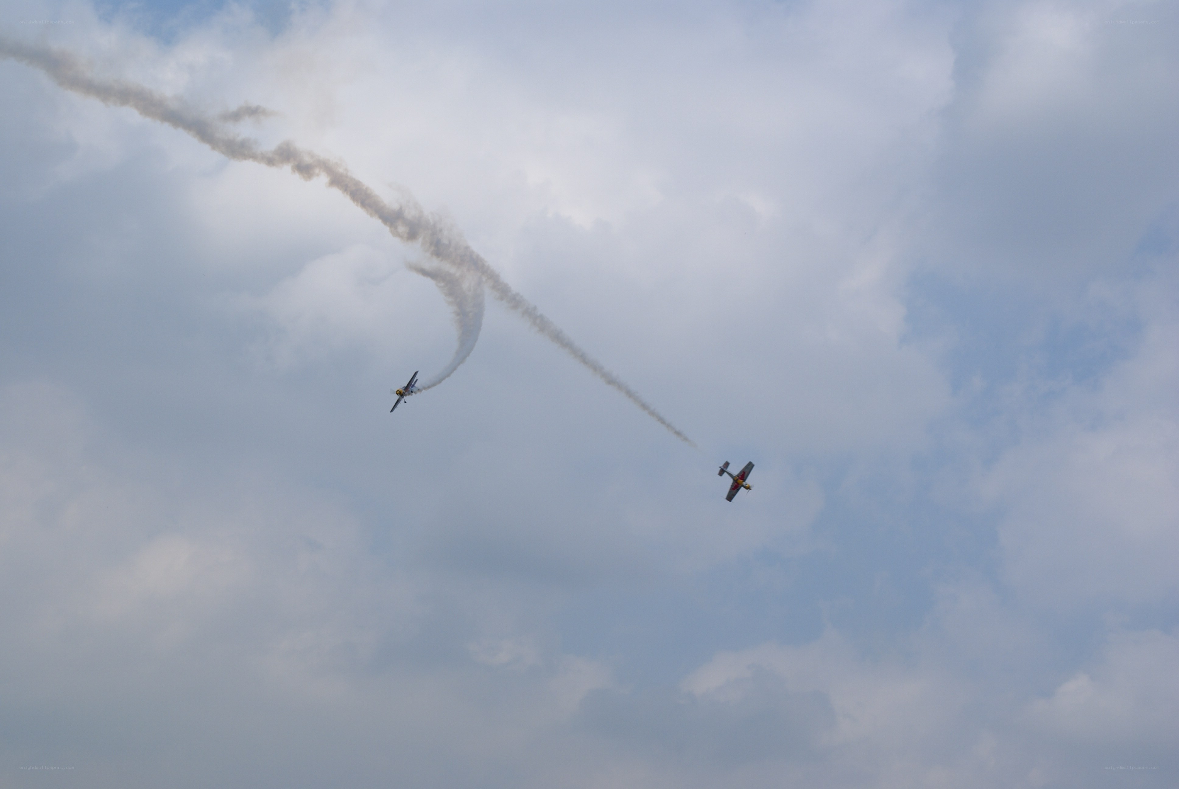 Aerobatic planes in flight