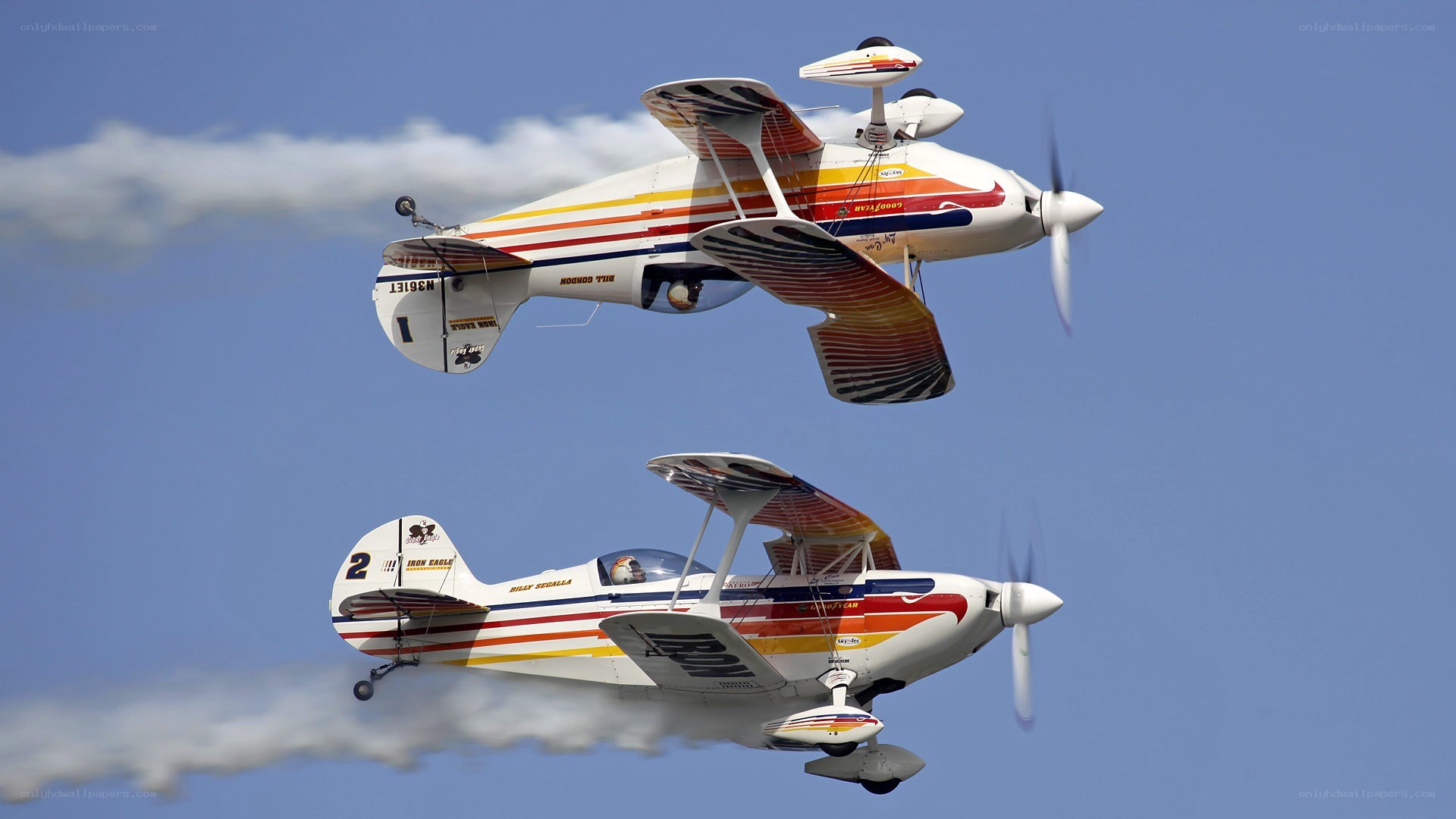 Aerobatic planes in flight