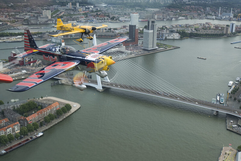 Aerobatic planes over a city