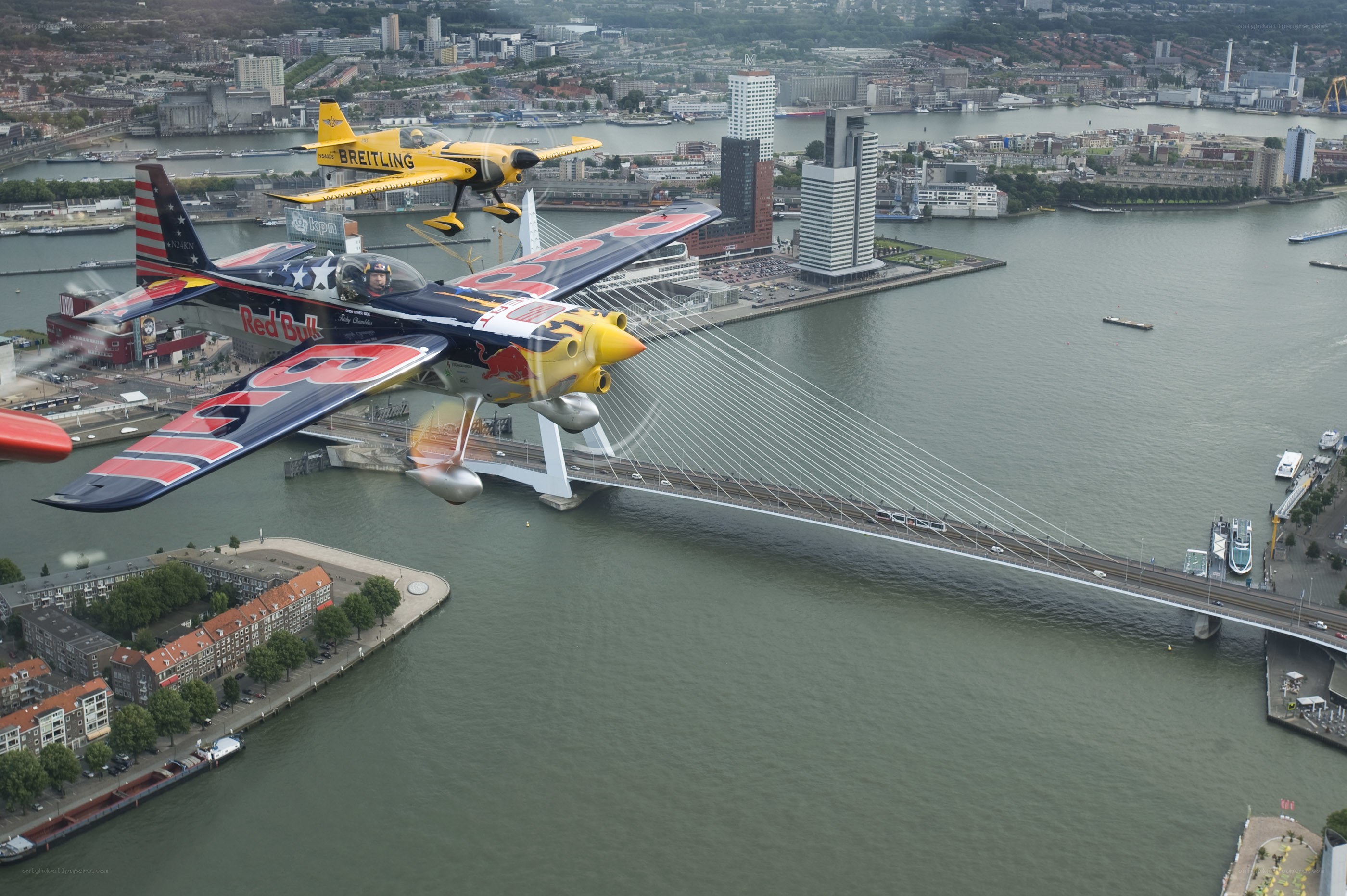 Aerobatic planes over a city
