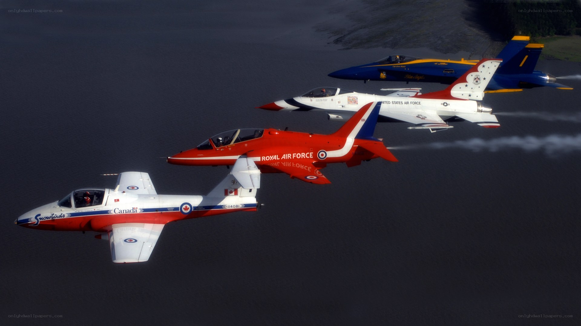 Aerobatic team flight over water