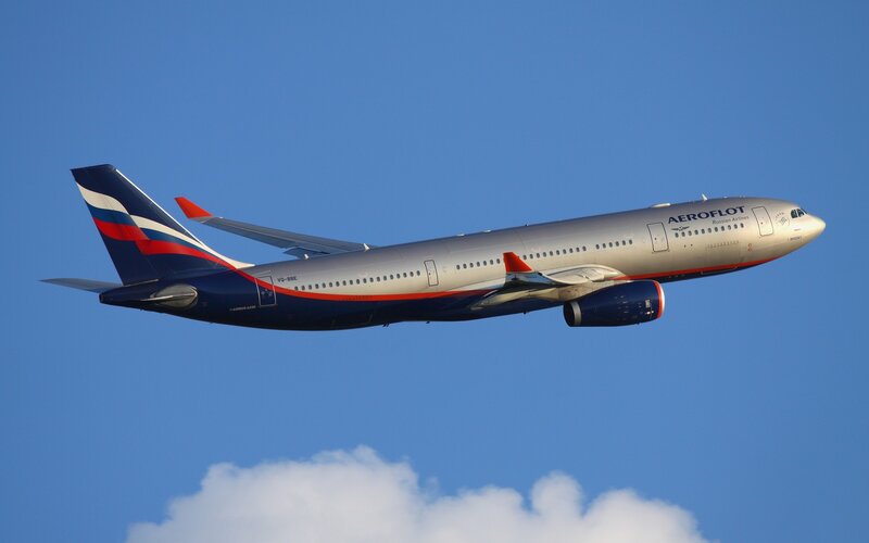 Aeroflot Airplane in Flight — Blue, Serene, Afternoon, Photograph