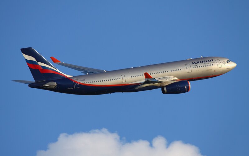 Aeroflot Airplane in Flight — Blue, Serene